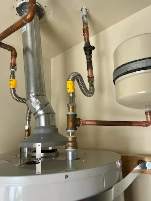 Water heater installation and plumbing repair in Foster